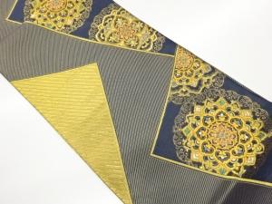 変わり色紙に華紋模様織出し全通袋帯